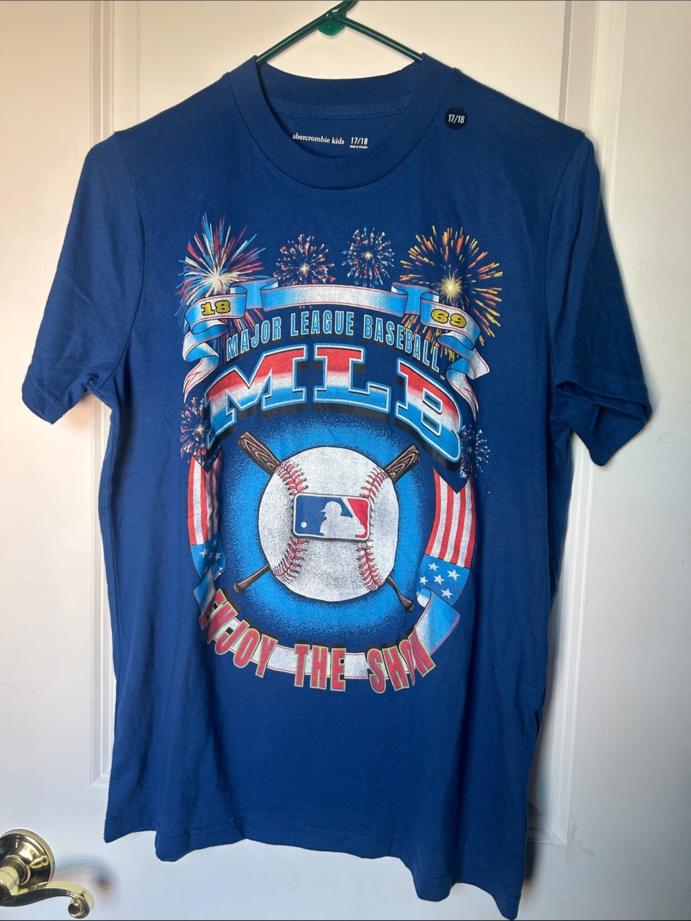 MLB Blue Short Sleeve Graphic Tee with Fireworks Baseball Design